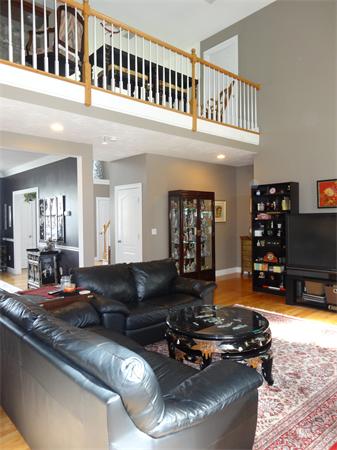 34 Draper Woods Road Sturbridge, MA 01518 - Photo 4 of 27 a living room with furniture and a flat screen tv