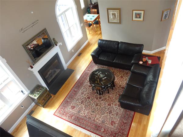 34 Draper Woods Road Sturbridge, MA 01518 - Photo 5 of 27 a living room with furniture and a fireplace