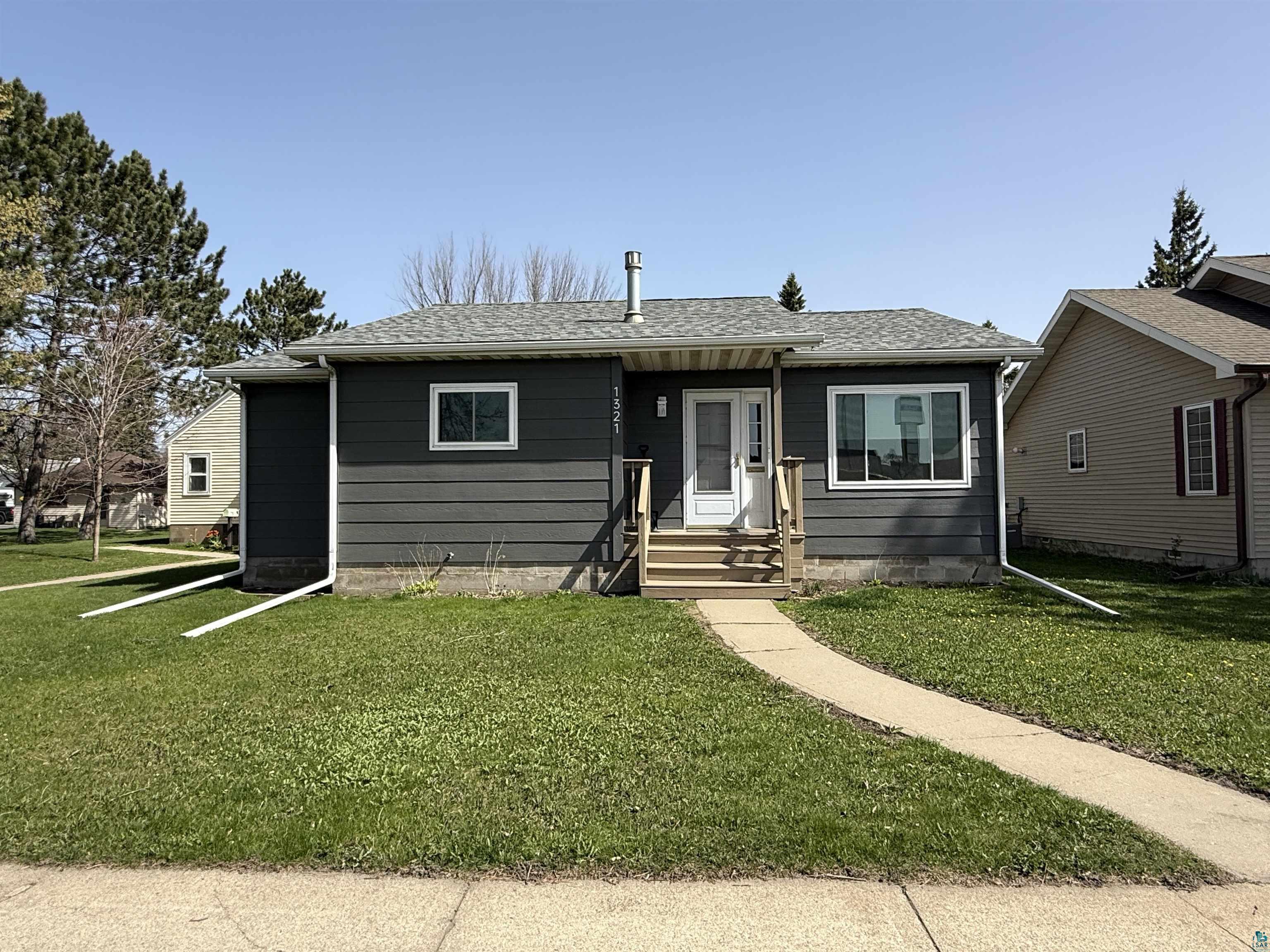1321 South 13th Street Virginia, MN 55792 - Photo 1 of 33 Single-story residence featuring gray siding and a light gray shingle roof