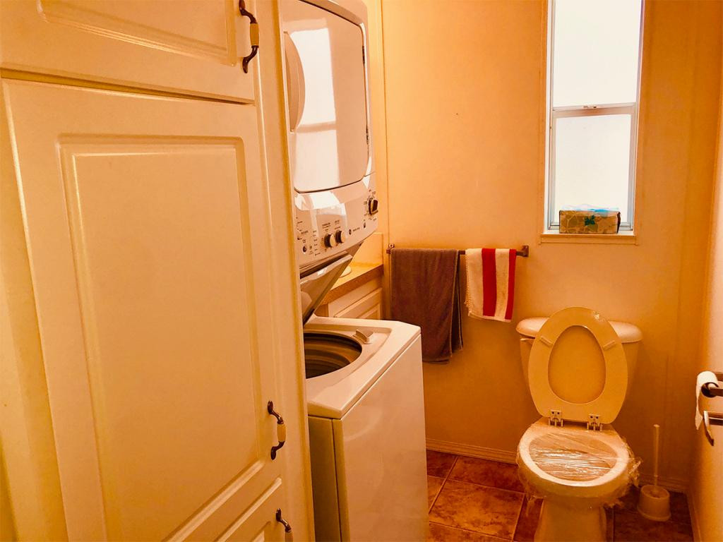 57 Temple Lane Naples, FL 34114 - Photo 18 of 18 a bathroom with a toilet and a sink