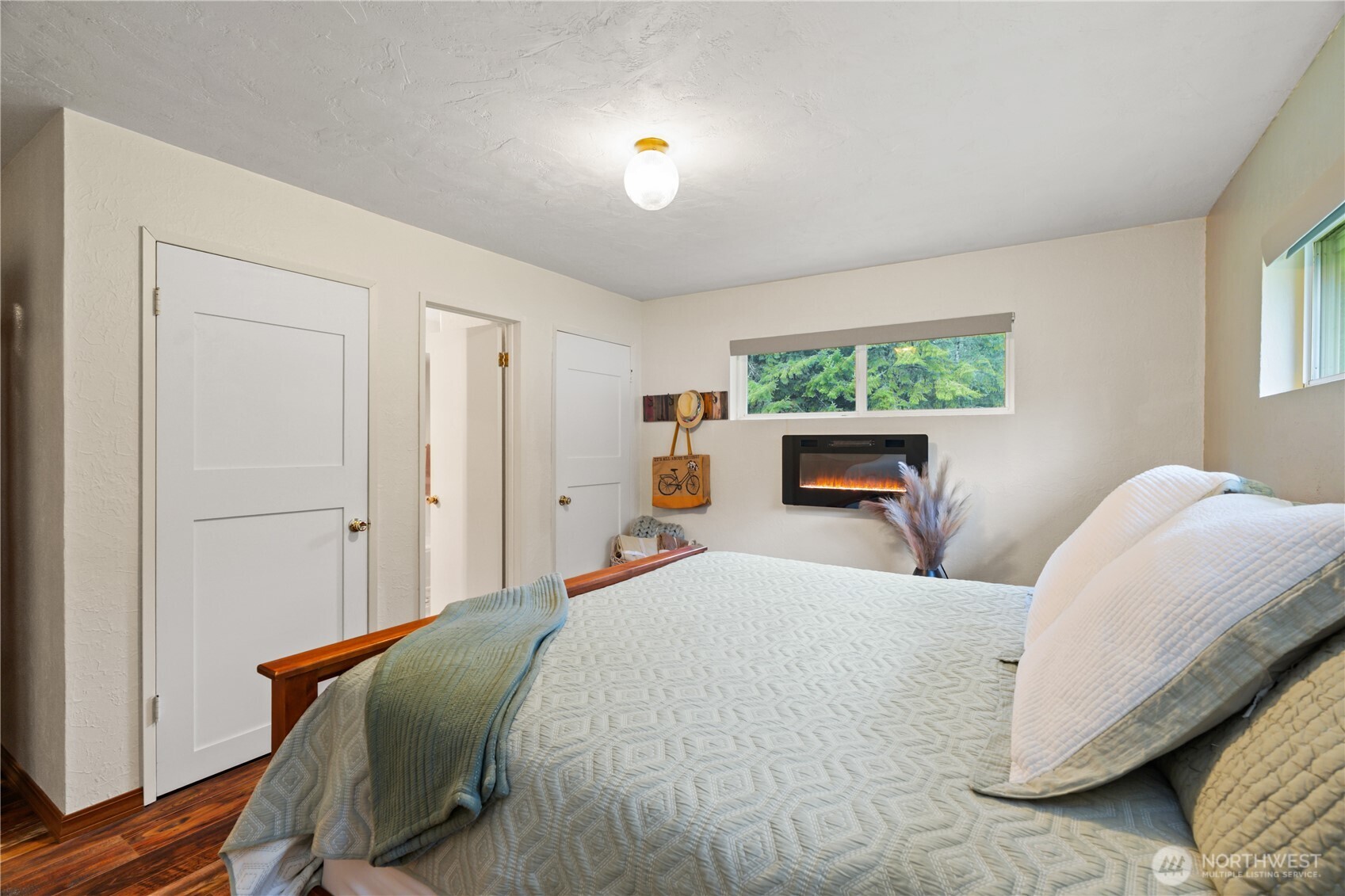 245 Joe Rocky Road Raymond, WA 98577 - Photo 14 of 40 a bedroom with a bed and a window