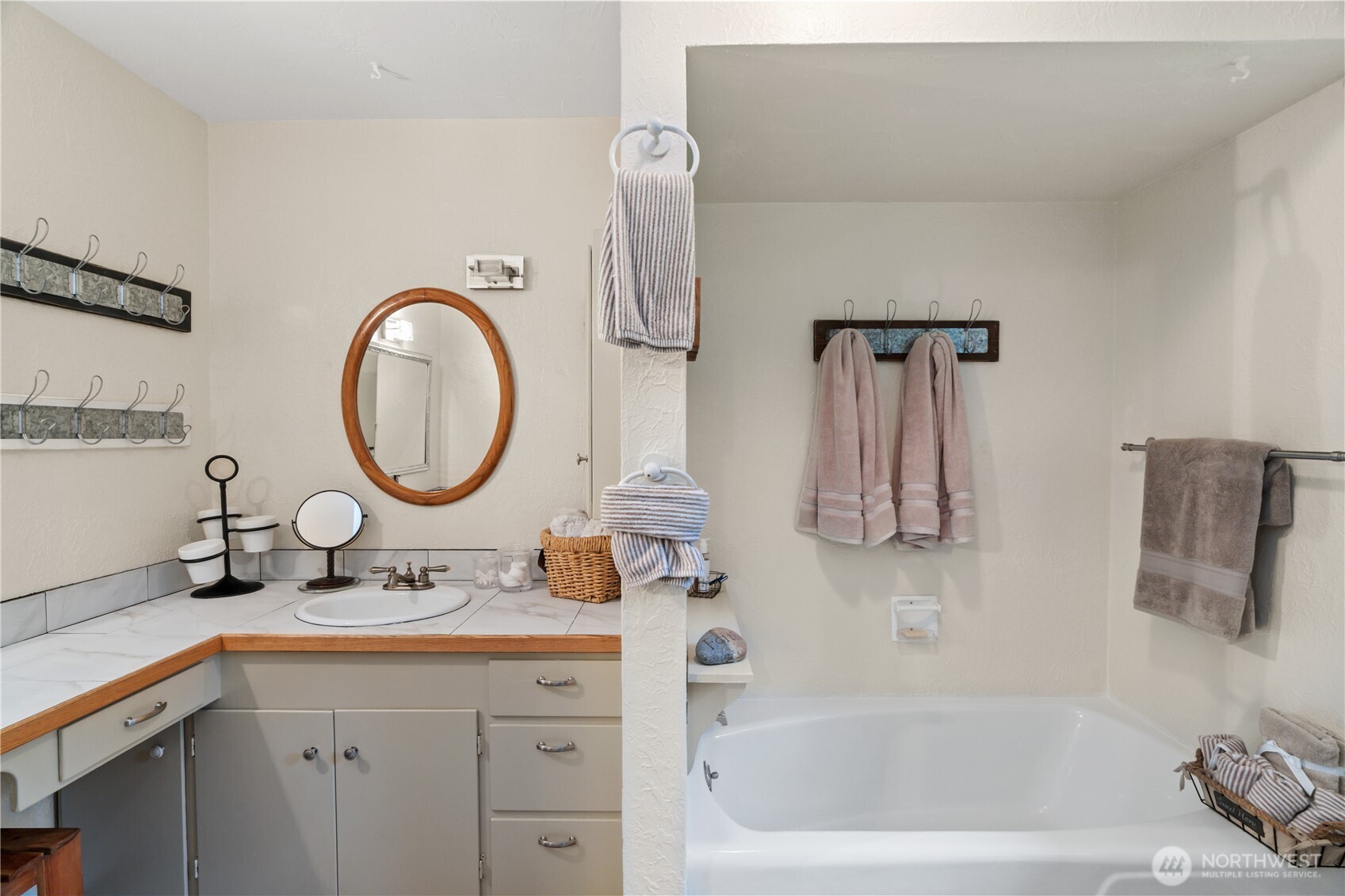 245 Joe Rocky Road Raymond, WA 98577 - Photo 15 of 40 a bathroom with a sink and a mirror
