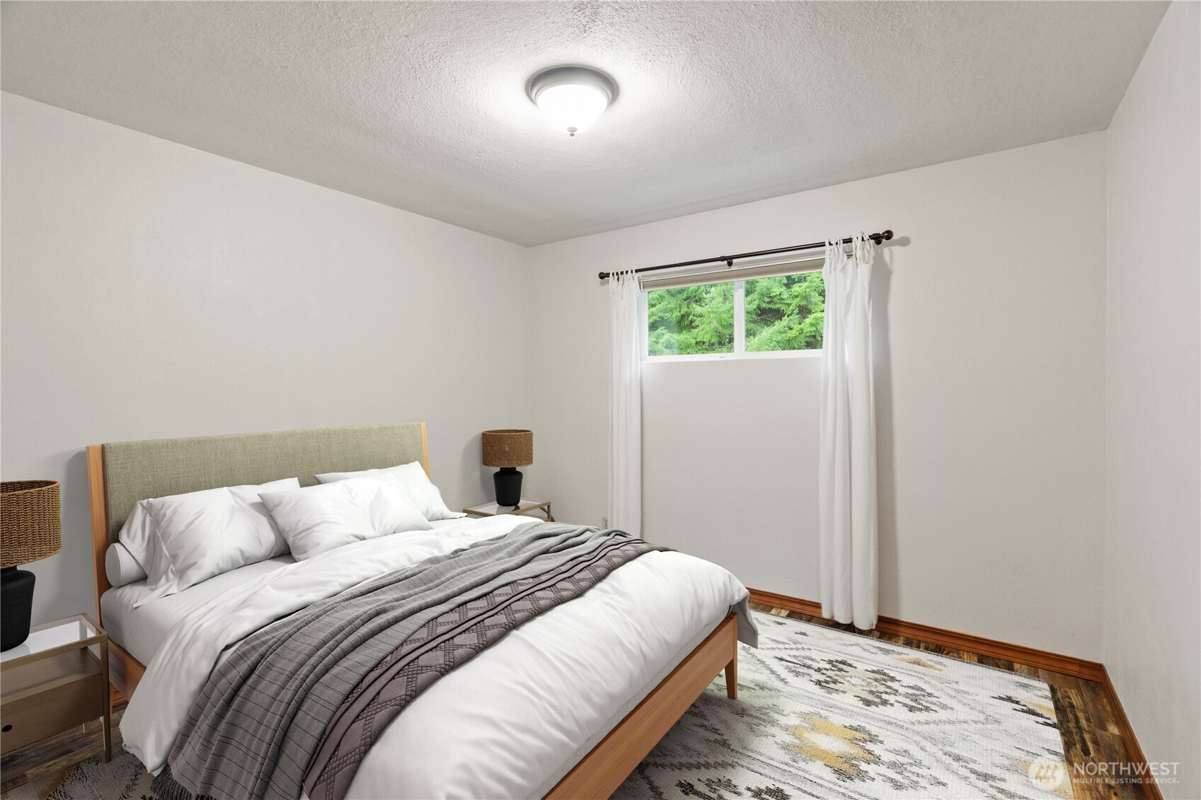 245 Joe Rocky Road Raymond, WA 98577 - Photo 18 of 40 a bedroom with a bed and a window