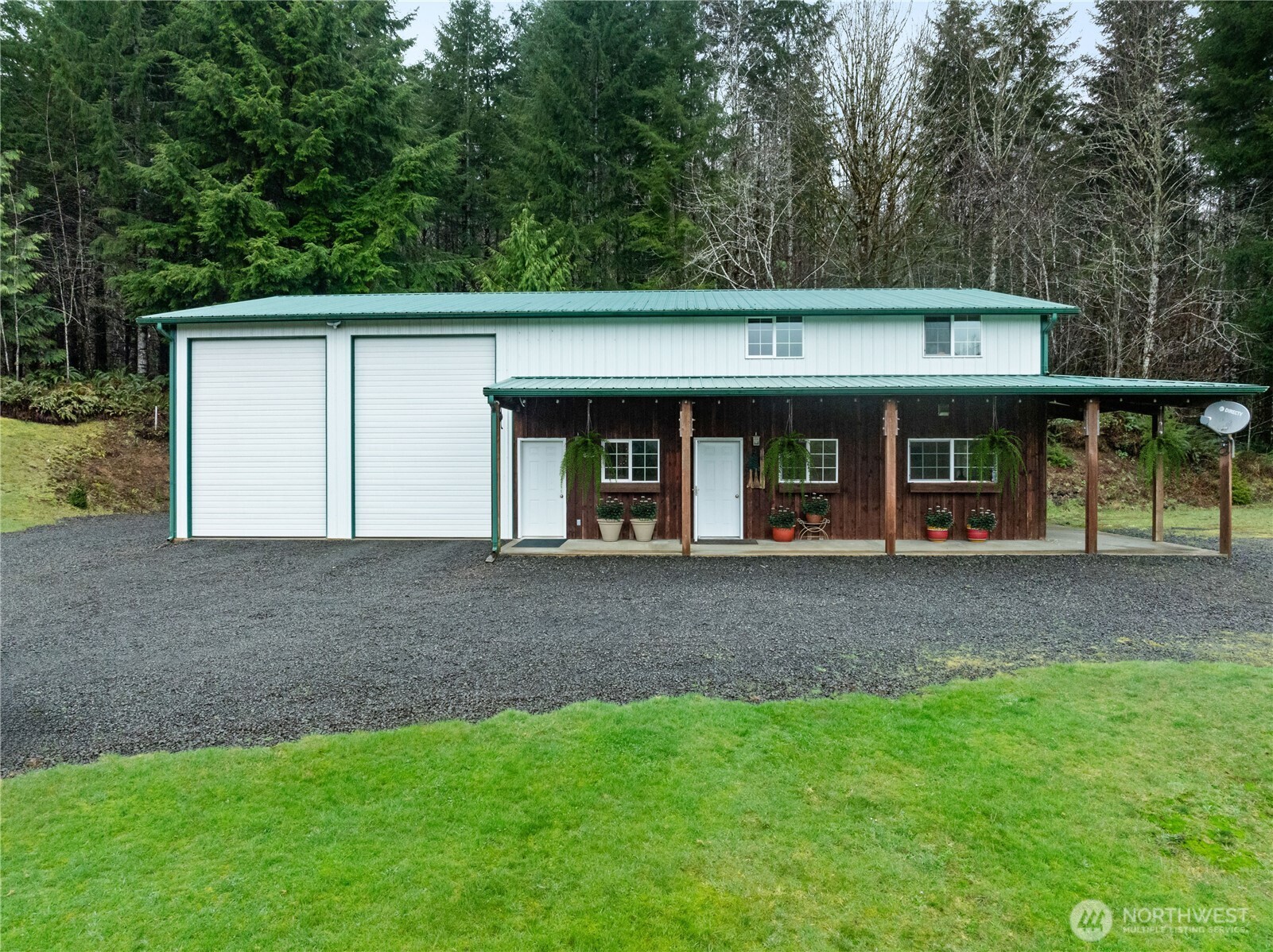 245 Joe Rocky Road Raymond, WA 98577 - Photo 27 of 40 a view of a house with a yard and large tree