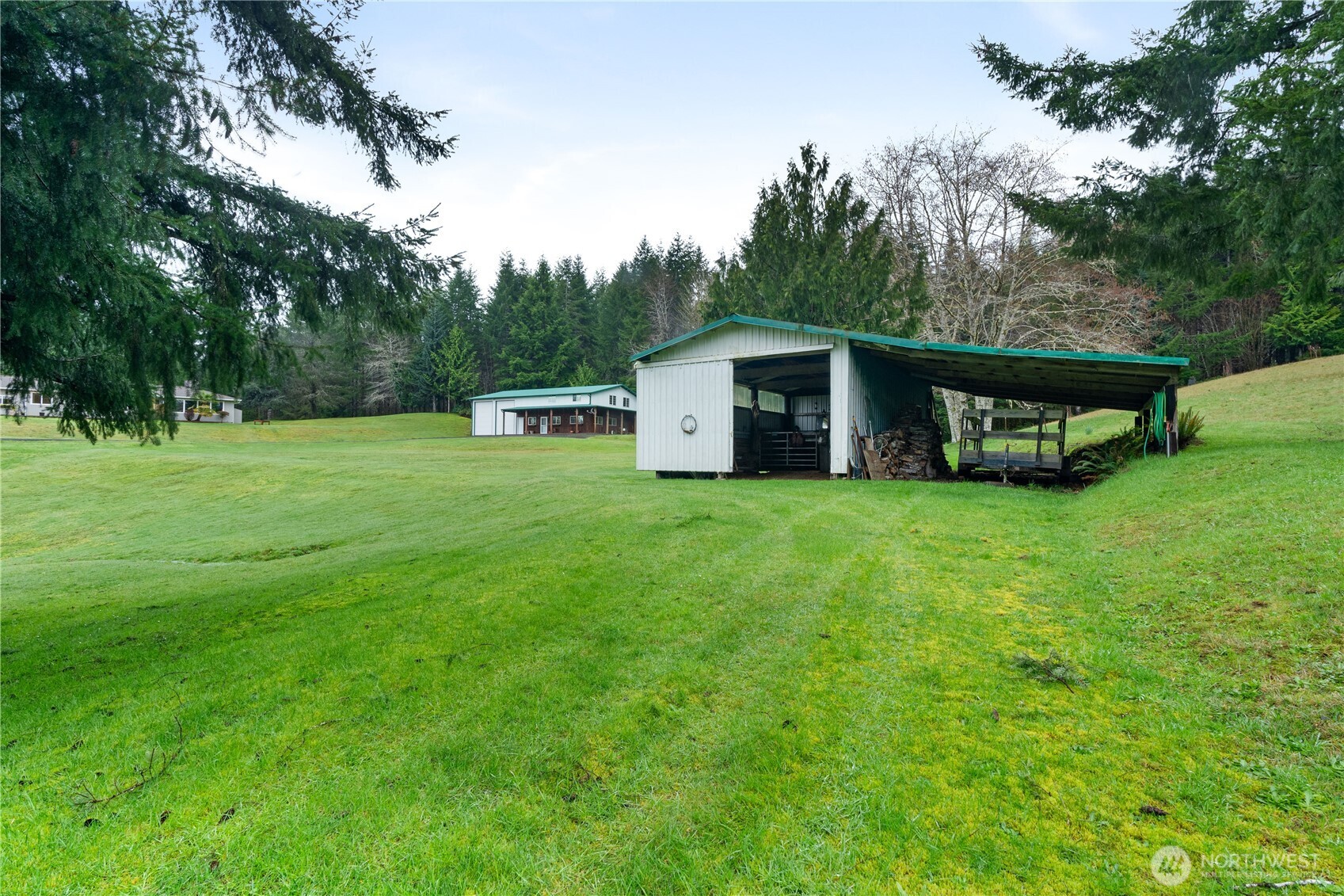 245 Joe Rocky Road Raymond, WA 98577 - Photo 34 of 40 a view of a house with a backyard