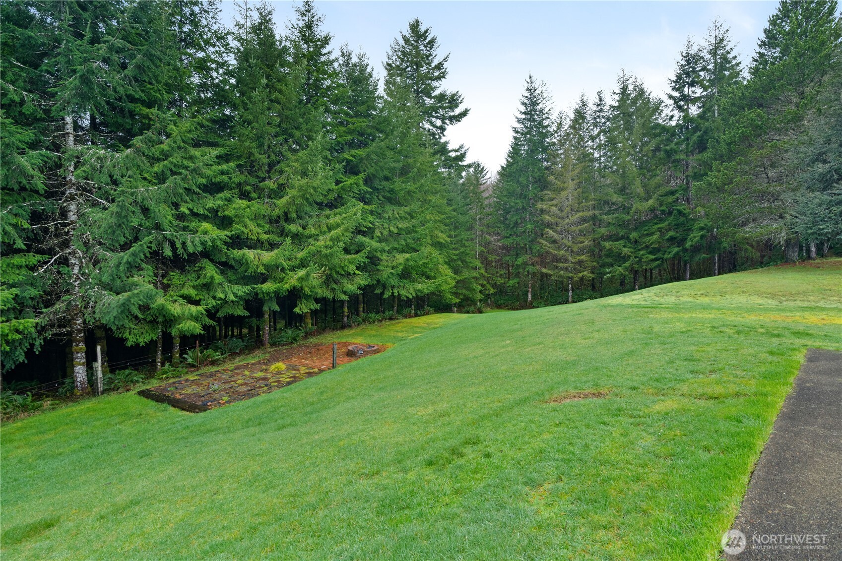 245 Joe Rocky Road Raymond, WA 98577 - Photo 37 of 40 a view of a backyard with a small park