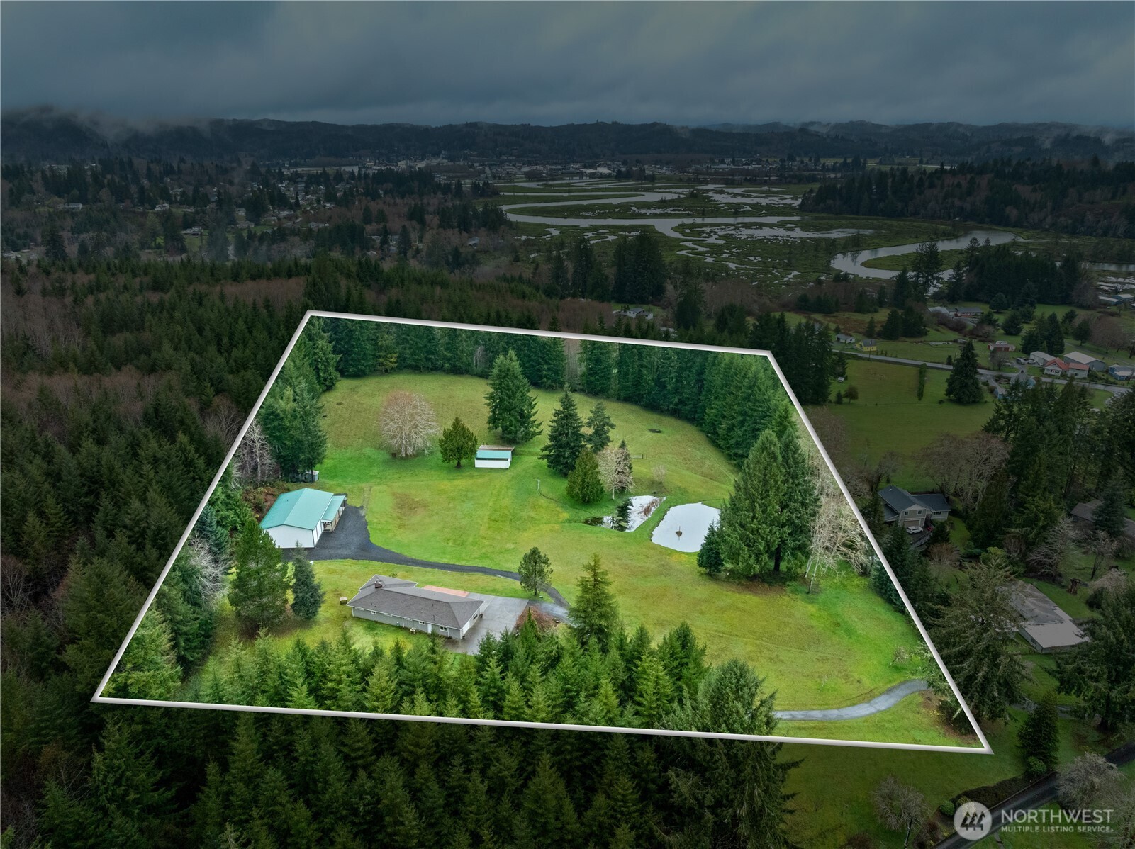 245 Joe Rocky Road Raymond, WA 98577 - Photo 39 of 40 a view of a yard from a balcony