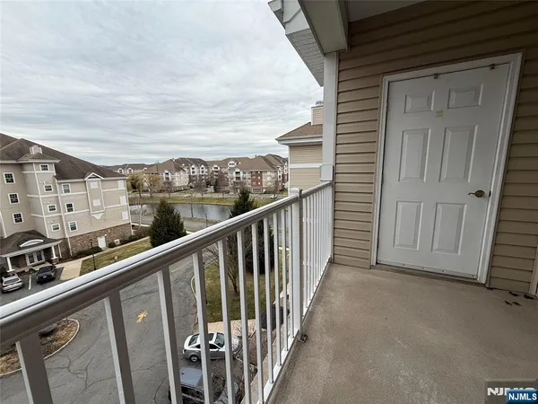 a media room with lots of chairs and mirrors