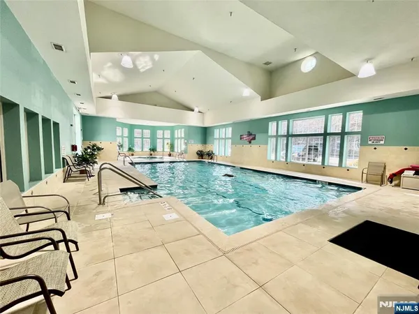 a view of a lake with a building in the background