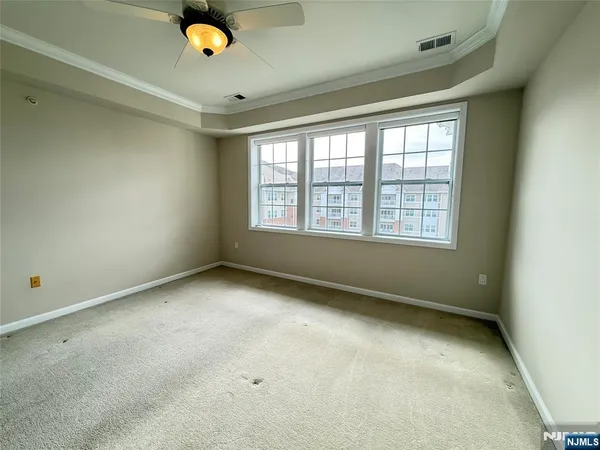 a bathroom with a shower sink and mirror