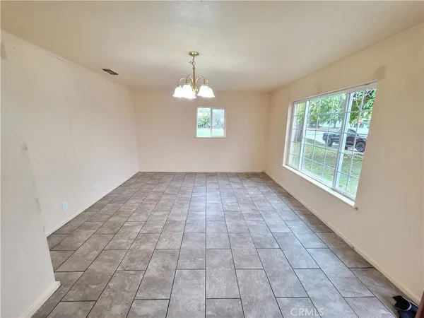 en empty room with windows