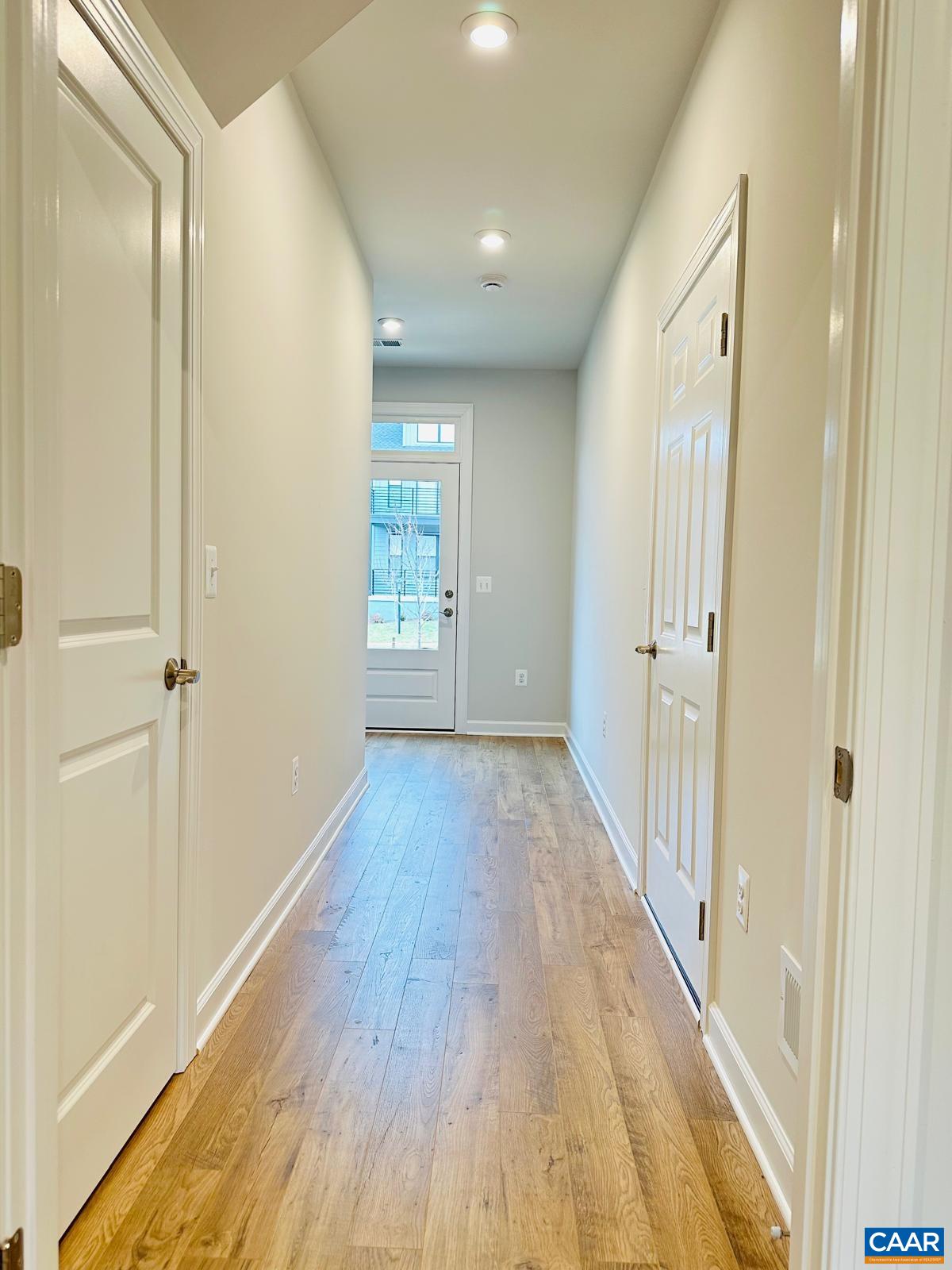 3223 Horizon Road Charlottesville, VA 22902 - Photo 26 of 30 This view is from the family room, with the storage closet on the left and the garage on the right.