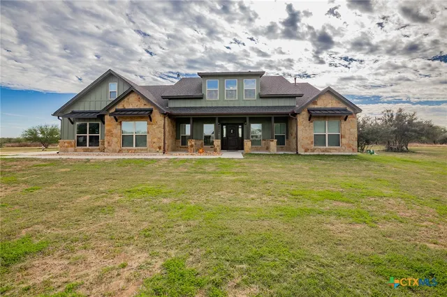 a front view of house with yard