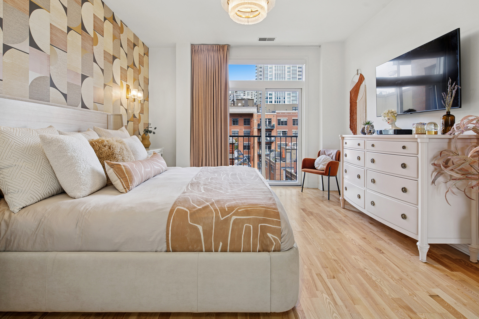 560 West Fulton Street, Unit 503 Chicago, IL 60661 - Photo 15 of 25 a bedroom with a bed and with cabinets