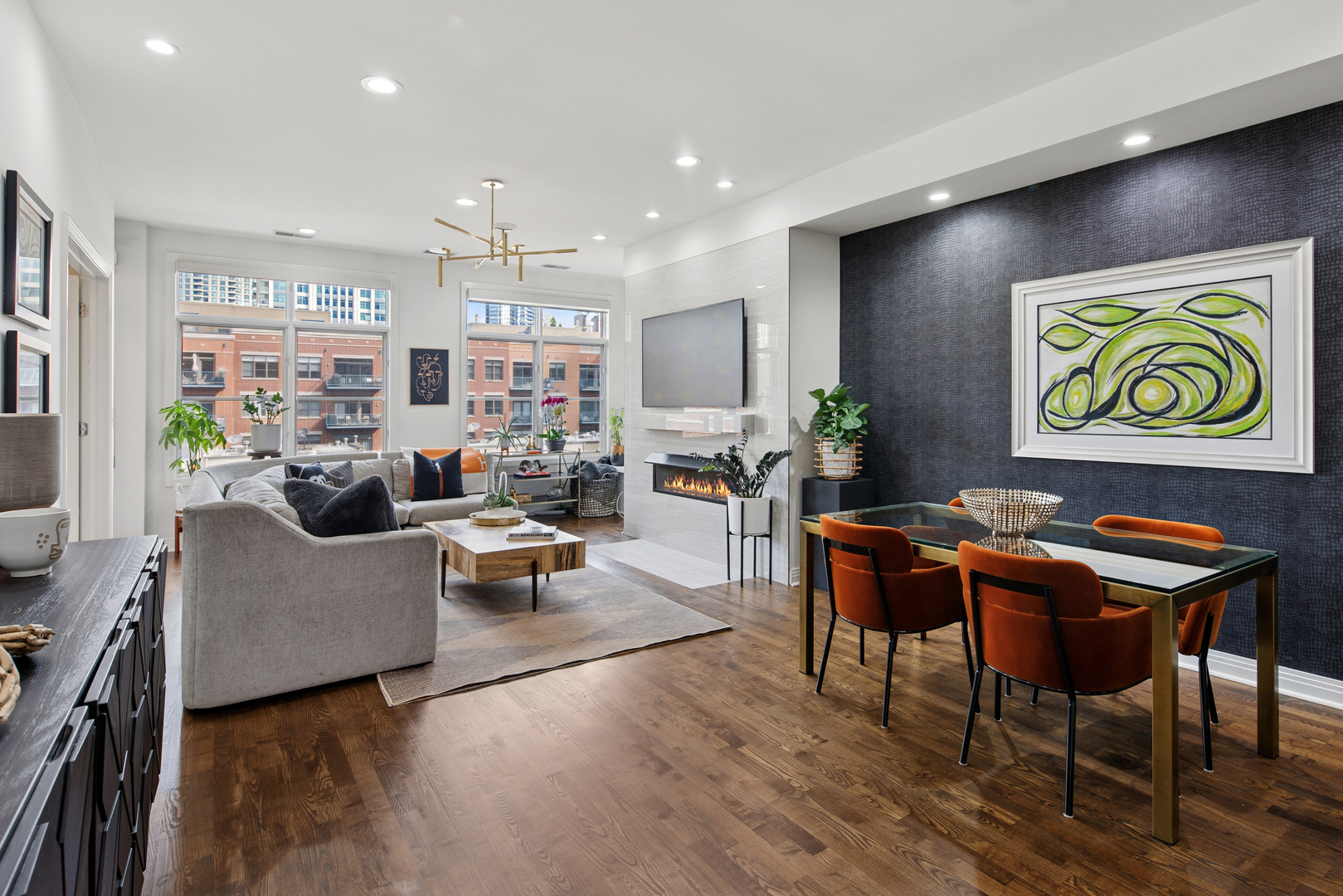 560 West Fulton Street, Unit 503 Chicago, IL 60661 - Photo 2 of 25 a living room with furniture and kitchen view