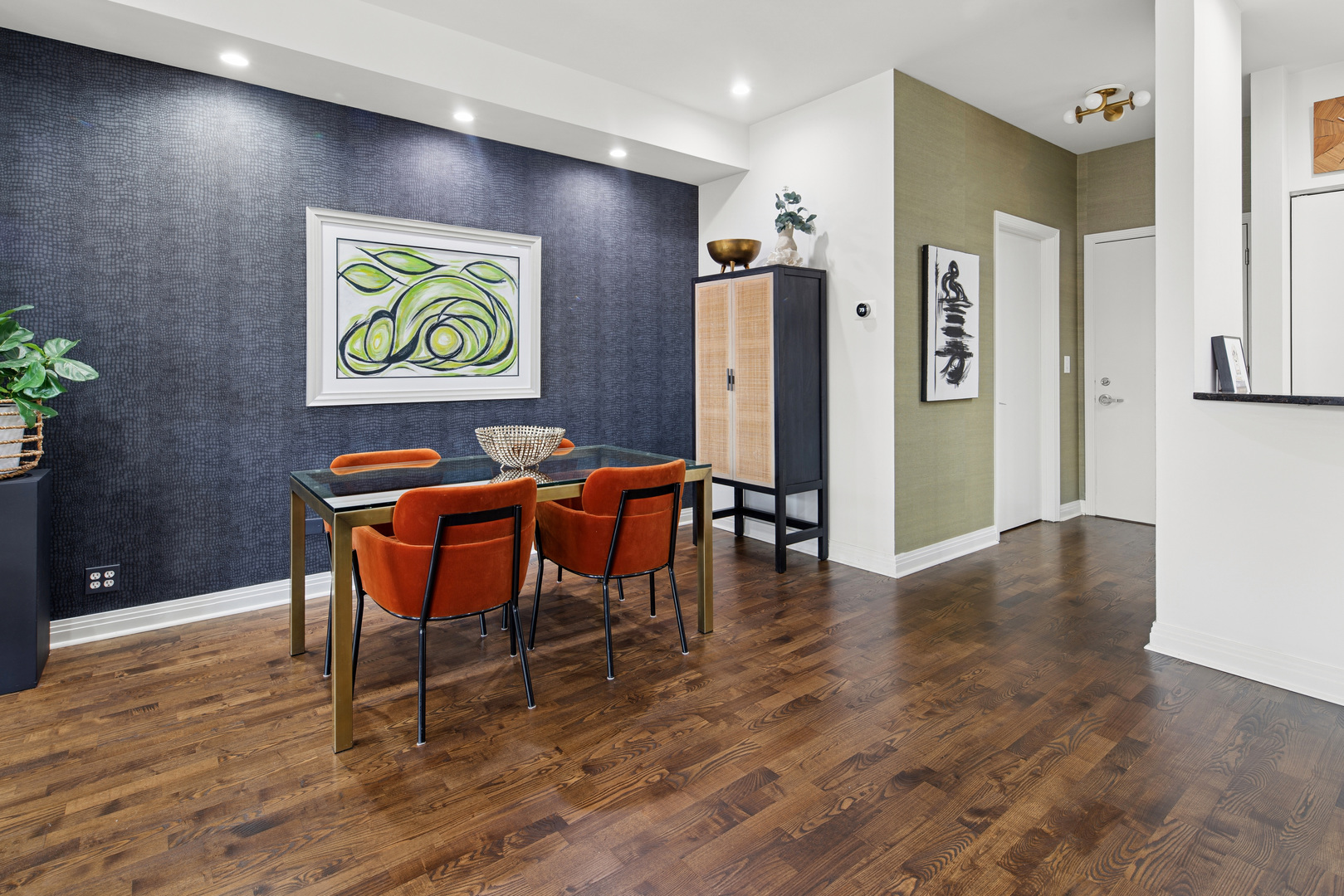 560 West Fulton Street, Unit 503 Chicago, IL 60661 - Photo 8 of 25 a view of a dining room with furniture and wooden floor