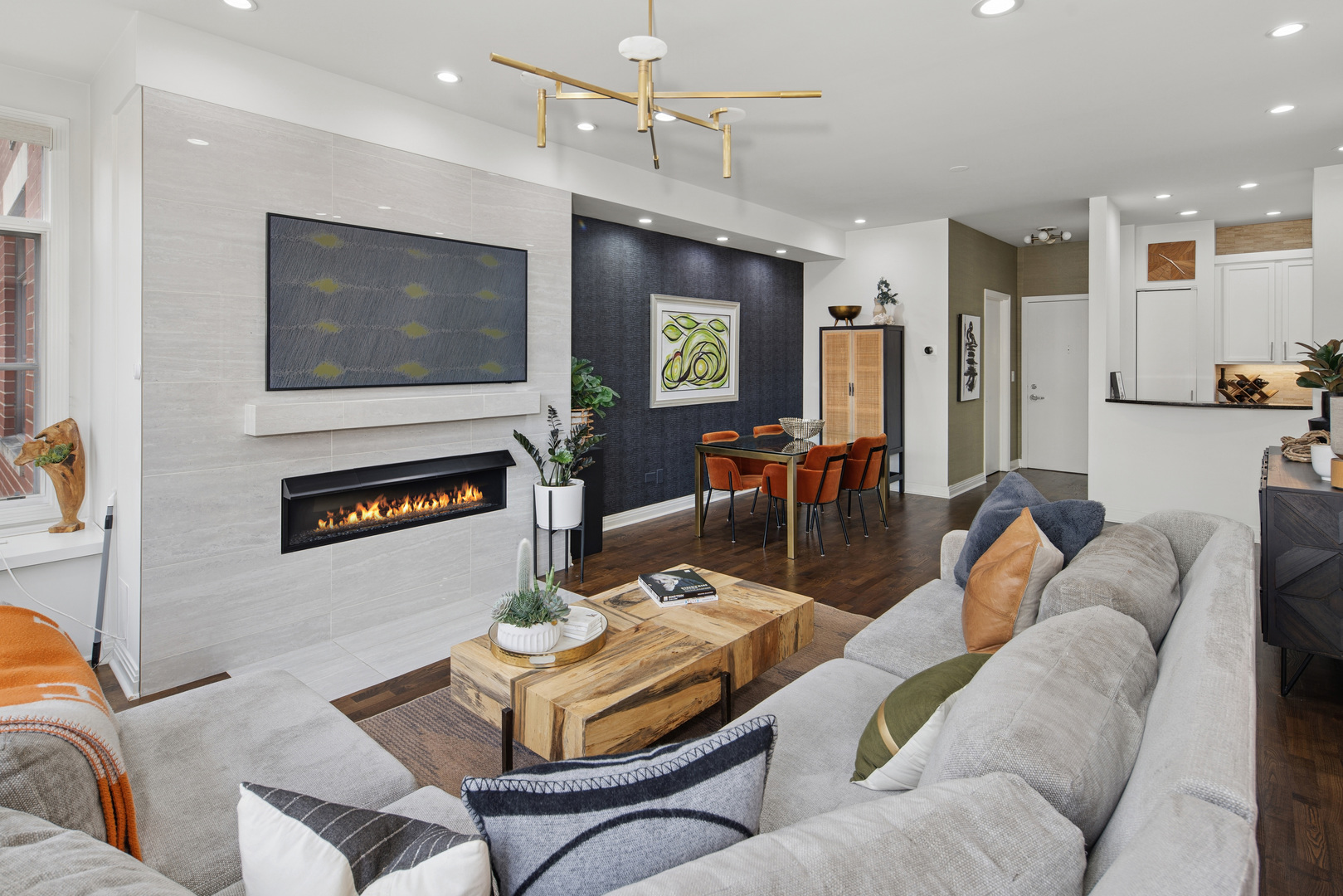 560 West Fulton Street, Unit 503 Chicago, IL 60661 - Photo 10 of 25 a living room with furniture and a flat screen tv