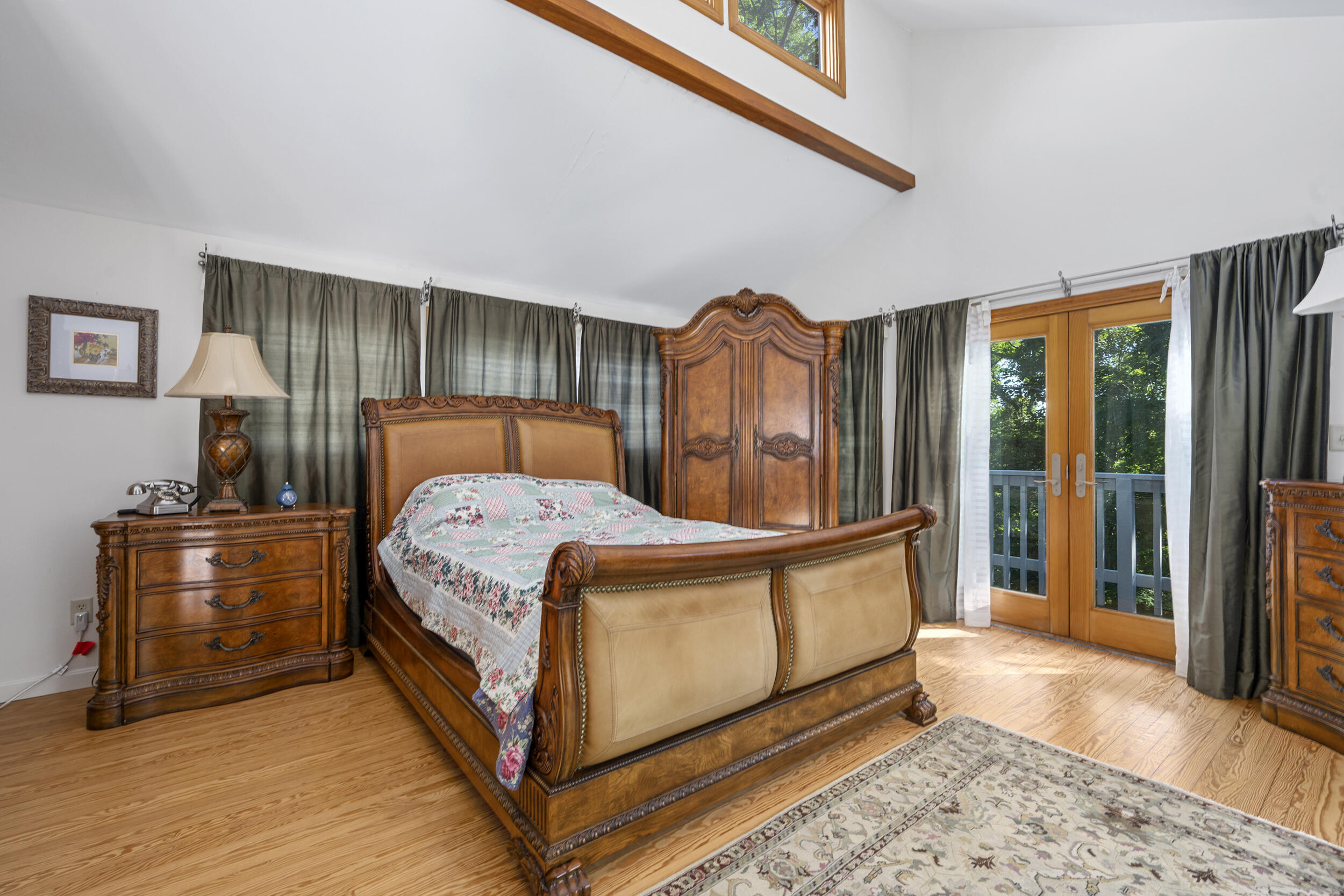 1875 State Highway Eastham, MA 02642 - Photo 23 of 69 a bed room with a bed and a dresser