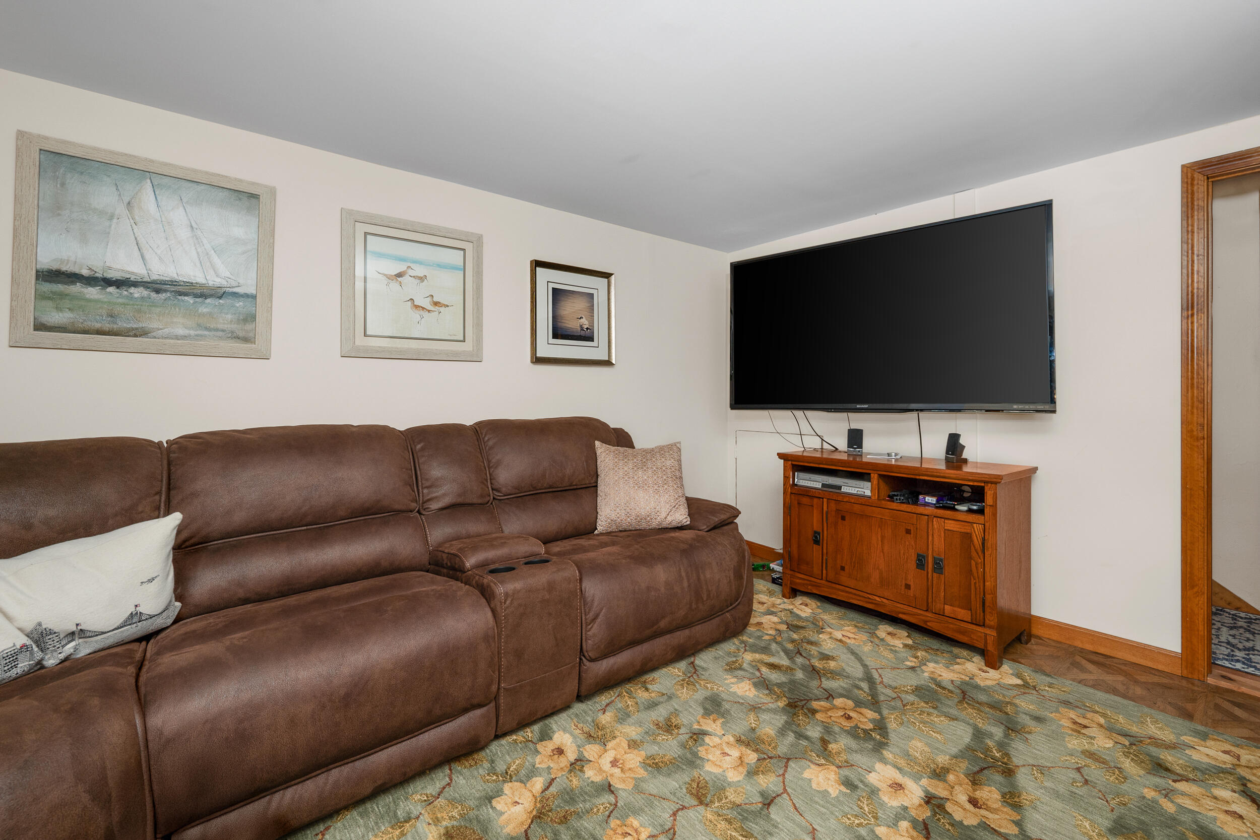 1875 State Highway Eastham, MA 02642 - Photo 38 of 69 a living room with furniture and a flat screen tv