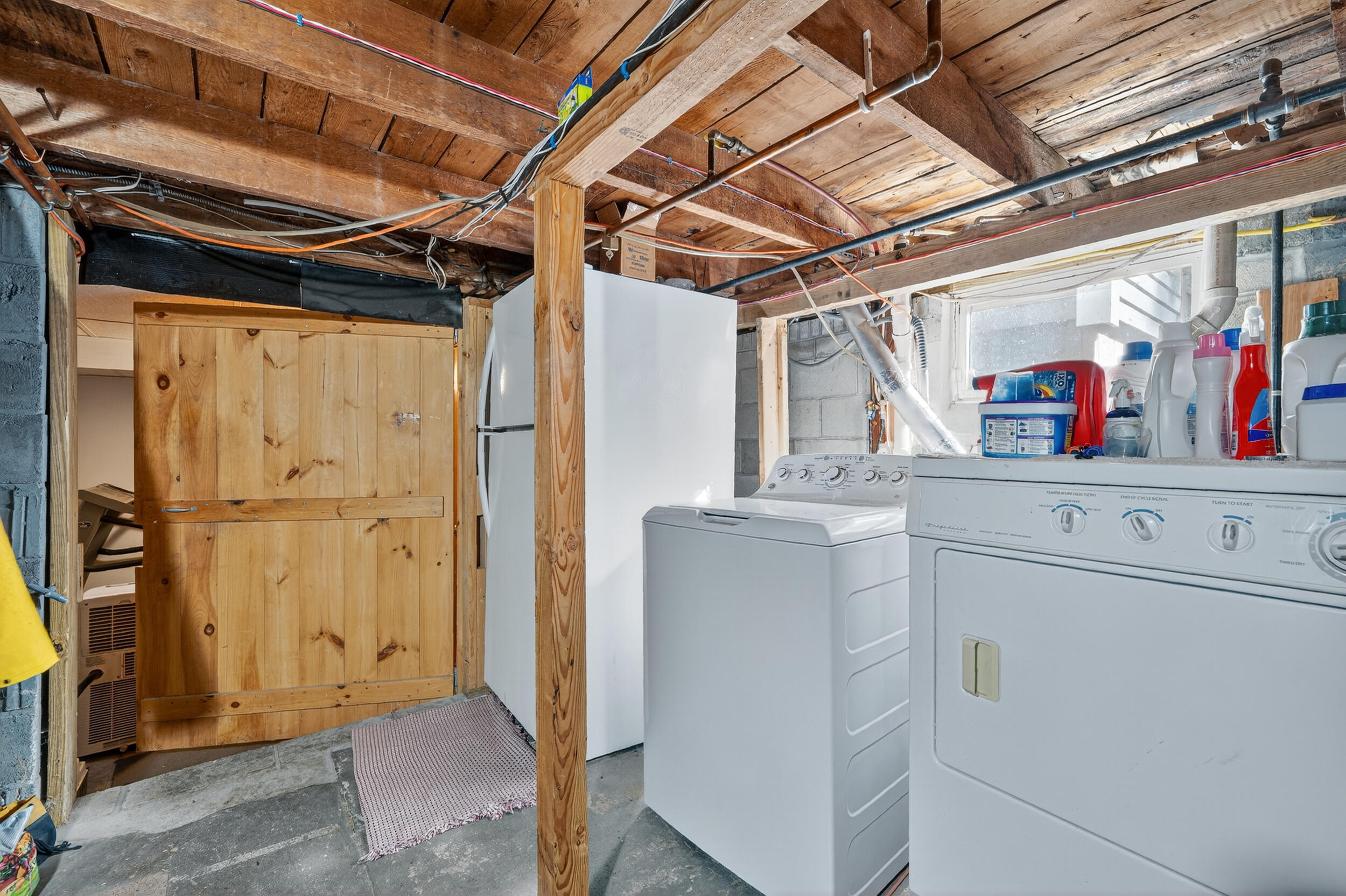 1875 State Highway Eastham, MA 02642 - Photo 39 of 69 a view of storage and utility room with washer and dryer