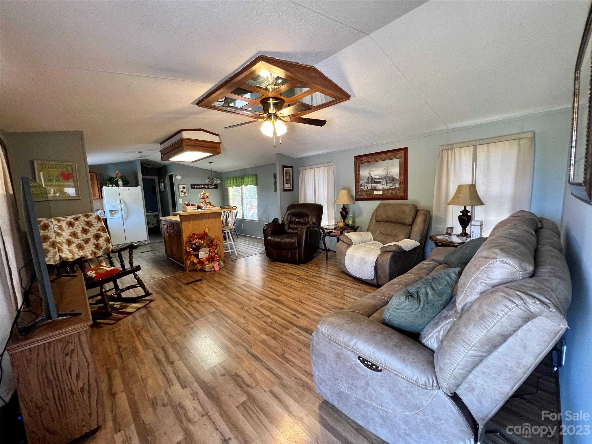 1508 Scenic View Road Hickory Grove, SC 29717 - Photo 11 of 24 a living room with furniture and wooden floor
