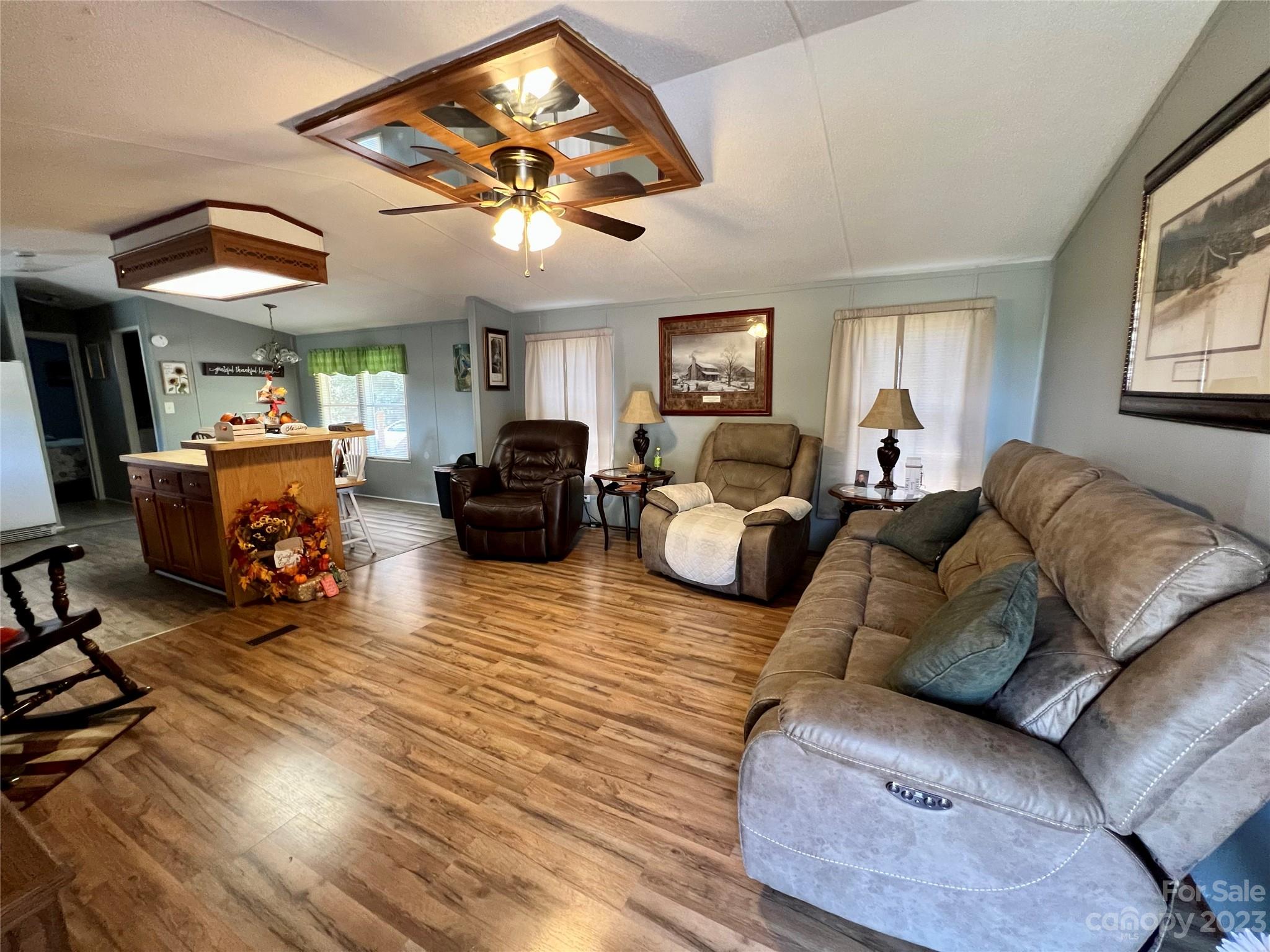 1508 Scenic View Road Hickory Grove, SC 29717 - Photo 12 of 24 a living room with furniture a fireplace and a large window