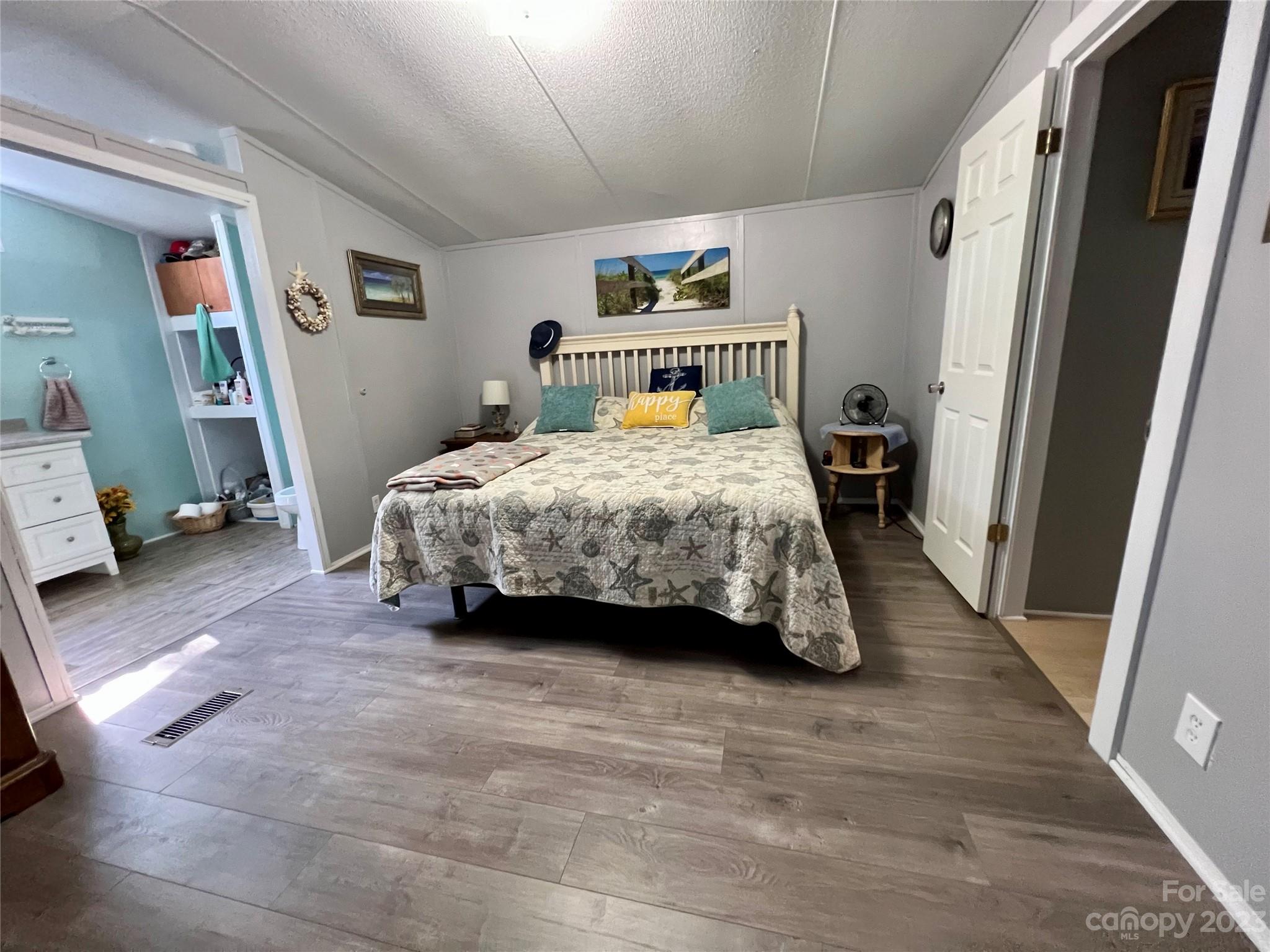 1508 Scenic View Road Hickory Grove, SC 29717 - Photo 16 of 24 a bedroom with a bed and a mirror