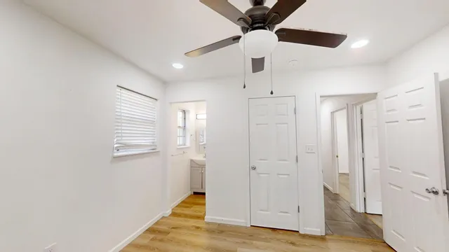 a view of an empty room and window