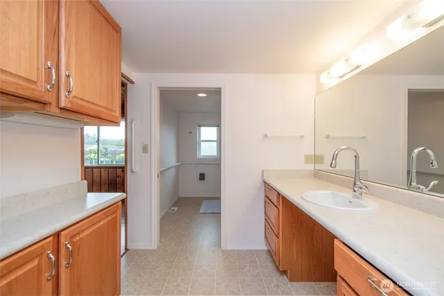 a bathroom with a bathtub and shower