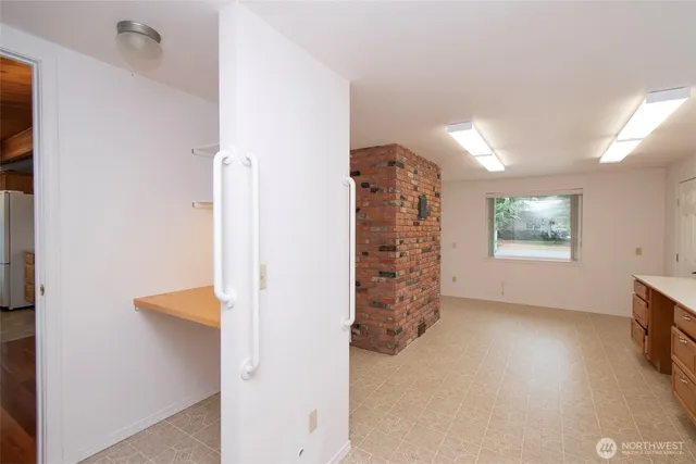 a view of cabinets and window