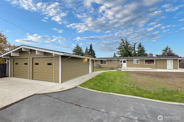 a view of a hall with wooden floor