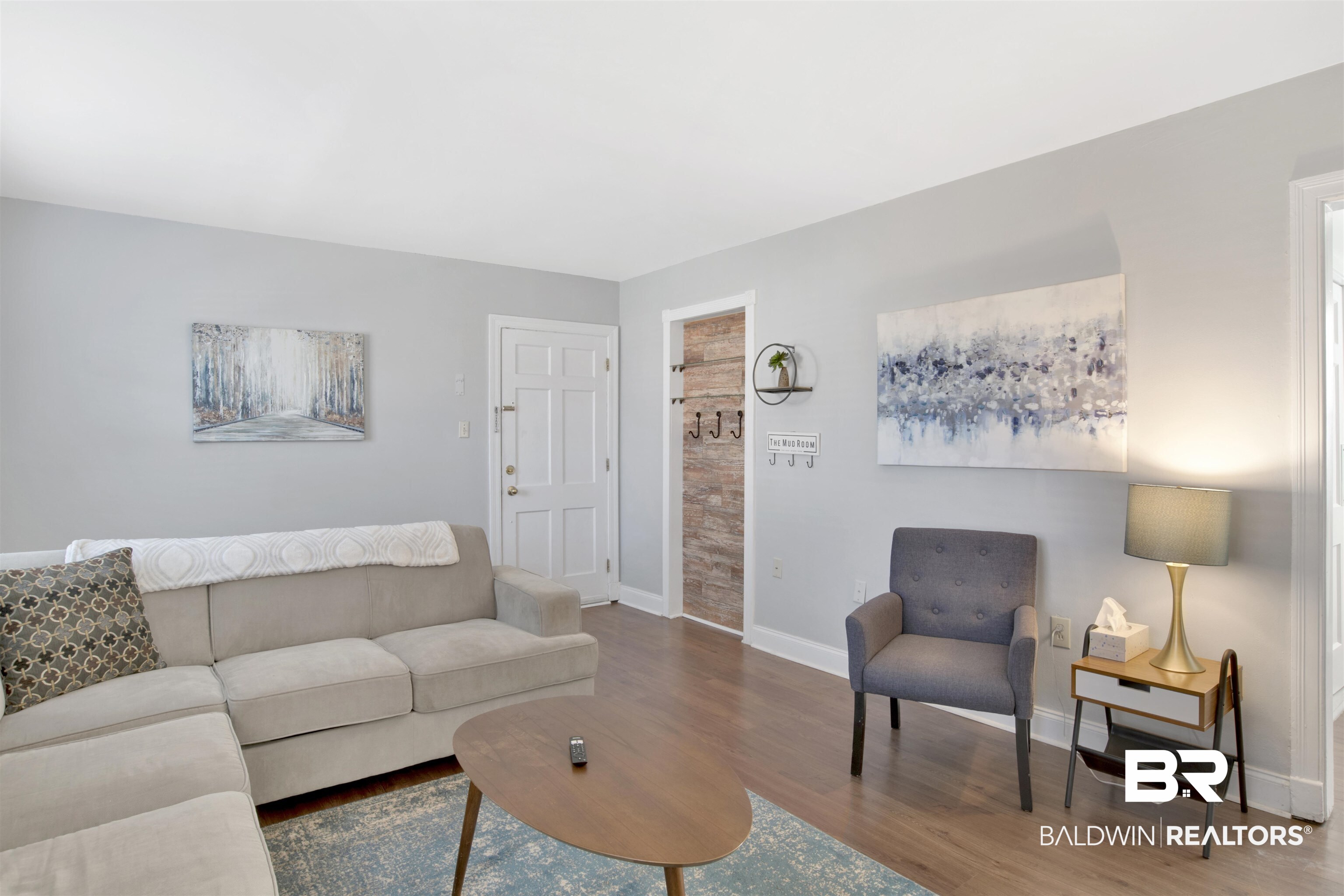 214 Upham Street, Unit 7A Mobile, AL 36607 - Photo 9 of 35 Living room featuring wood finished floors and baseboards