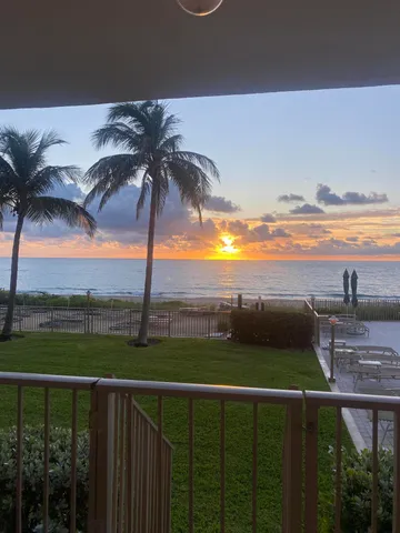 a view of a patio and a yard