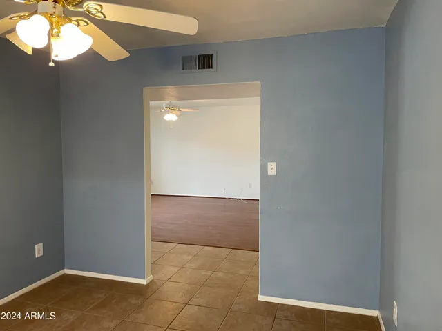 a view of a hallway and closet