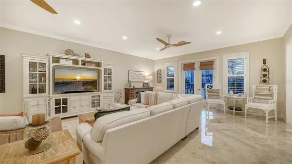 a kitchen with granite countertop stainless steel appliances a sink stove and window