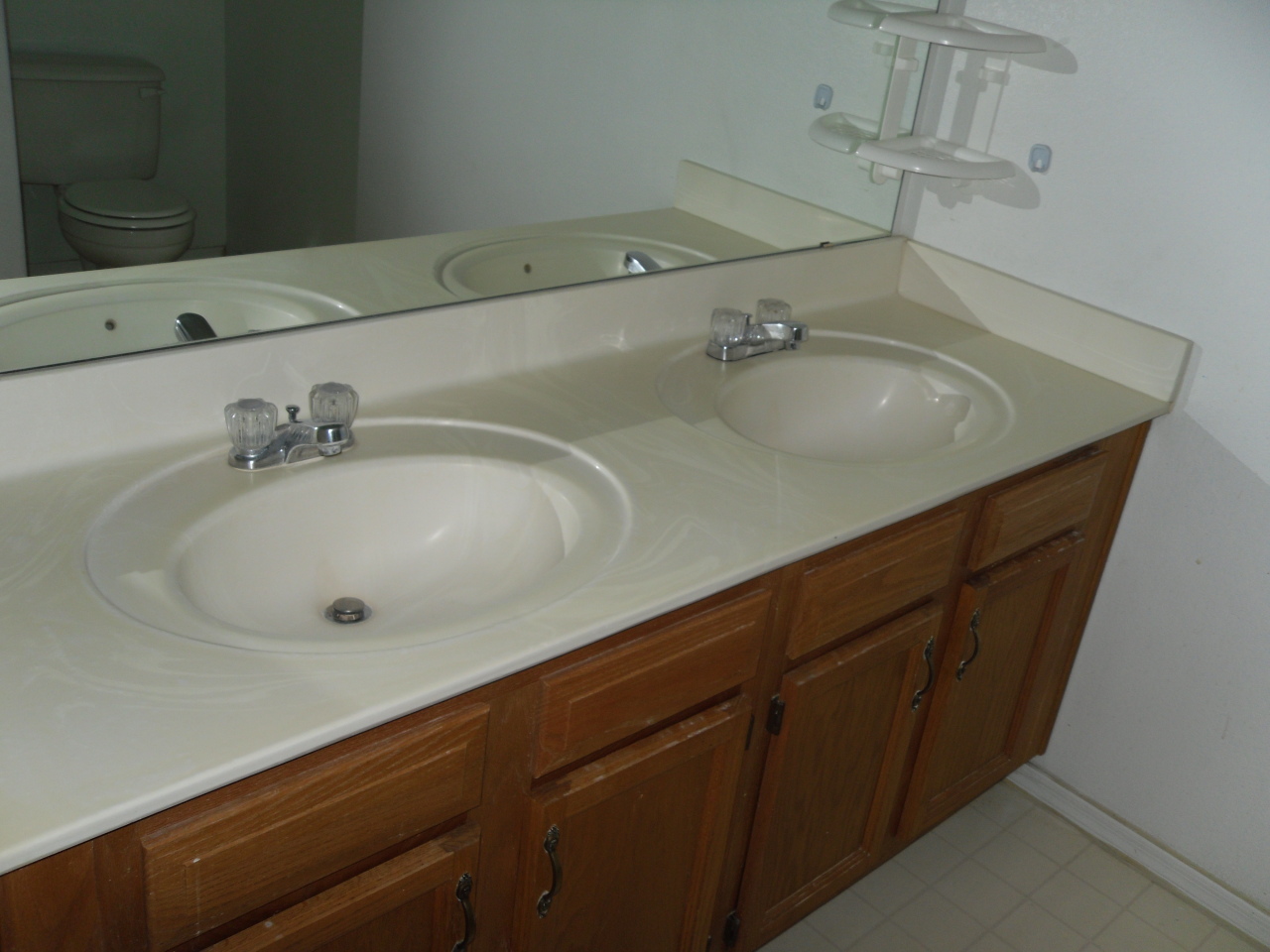 1431 East Carson Road Phoenix, AZ 85042 - Photo 13 of 25 a bathroom with a sink and a mirror