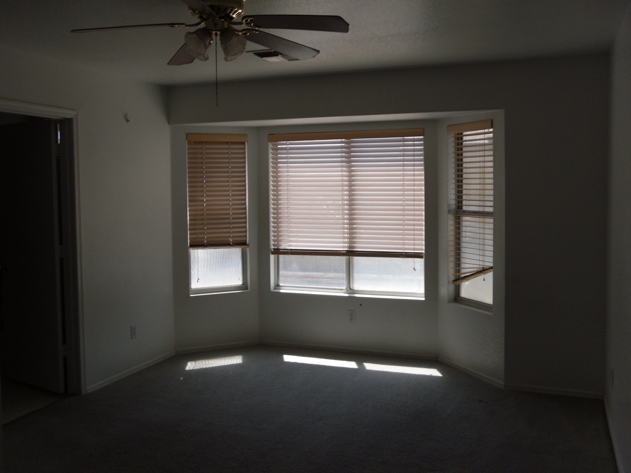 1431 East Carson Road Phoenix, AZ 85042 - Photo 10 of 25 a view of an empty room with a window