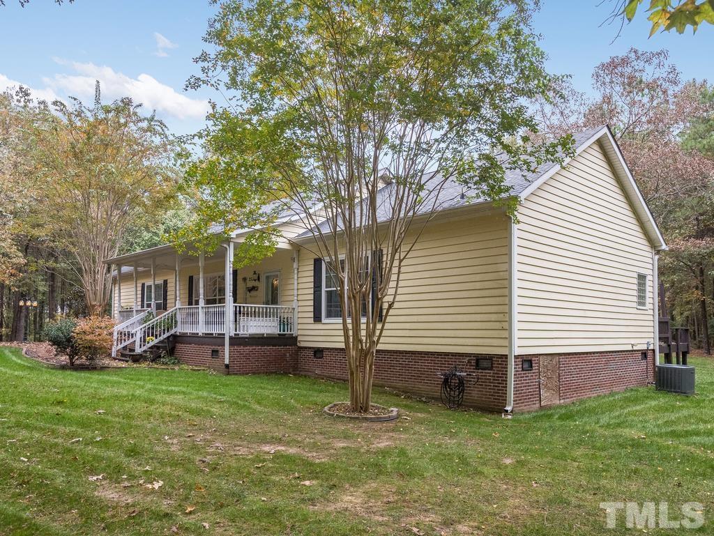 2525 Baptist Road Durham, NC 27703 - Photo 2 of 23 a view of a house with a backyard