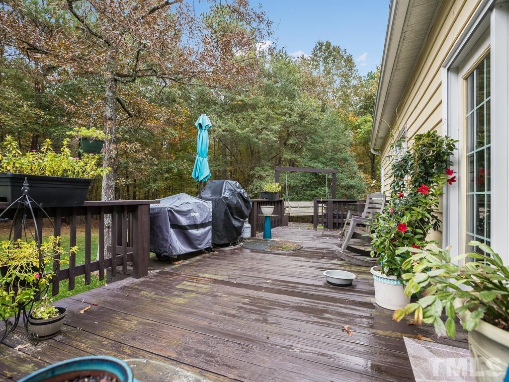 2525 Baptist Road Durham, NC 27703 - Photo 18 of 23 a view of a chairs and table in the patio