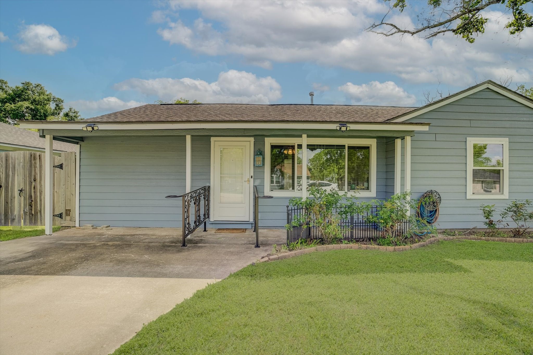 413 Farrer Street Angleton, TX 77515 - Photo 2 of 43 front view of house with a yard