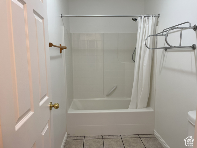 750 South Big Road Soda Springs, ID 83276 - Photo 29 of 40 Tub and shower combination with a grab bar, white subway tile surround, and tile flooring
