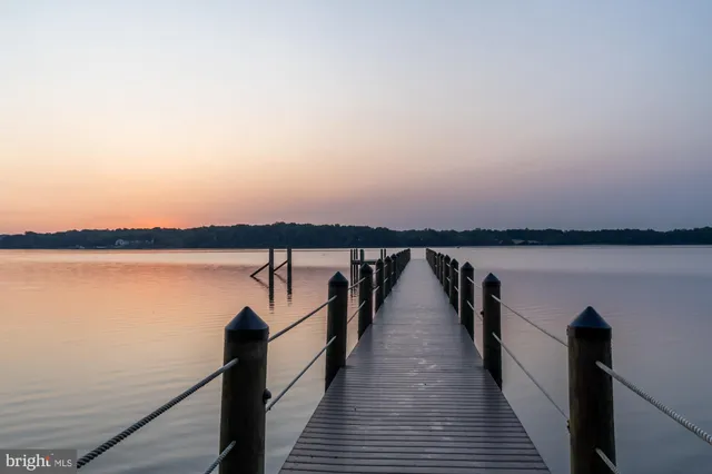 a view of wooden floor with a lake