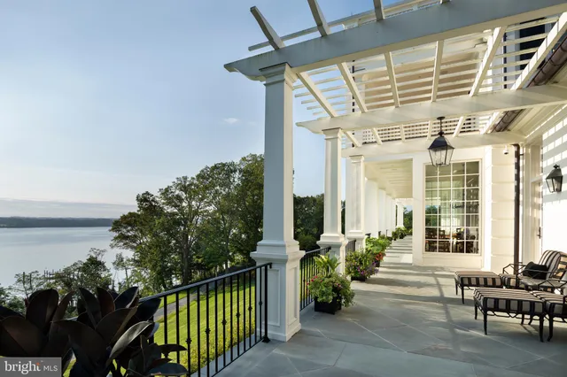 a porch with seating space and balcony