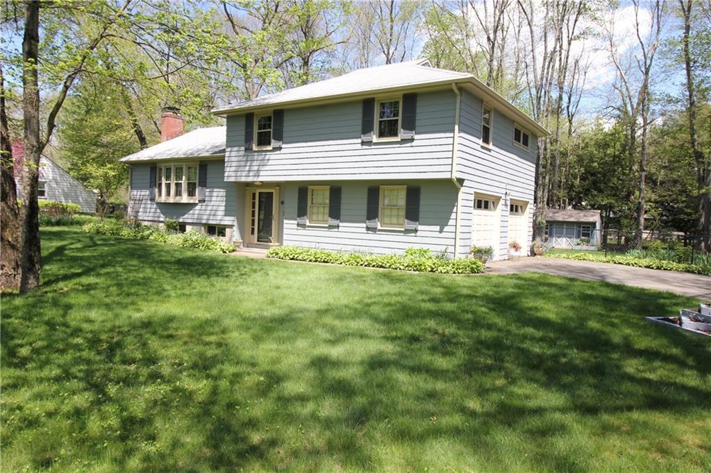 20 Guernsey Road Bloomfield, CT 06002 - Photo 1 of 1 a front view of a house with a yard