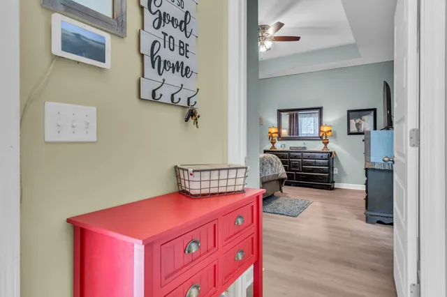 a kitchen with a refrigerator and a stove