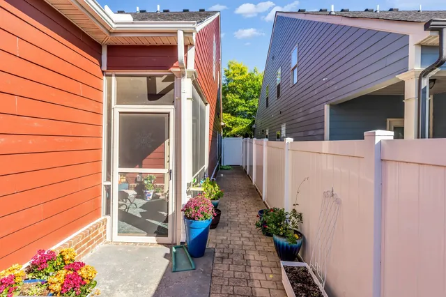 a view of a house with a potted plant