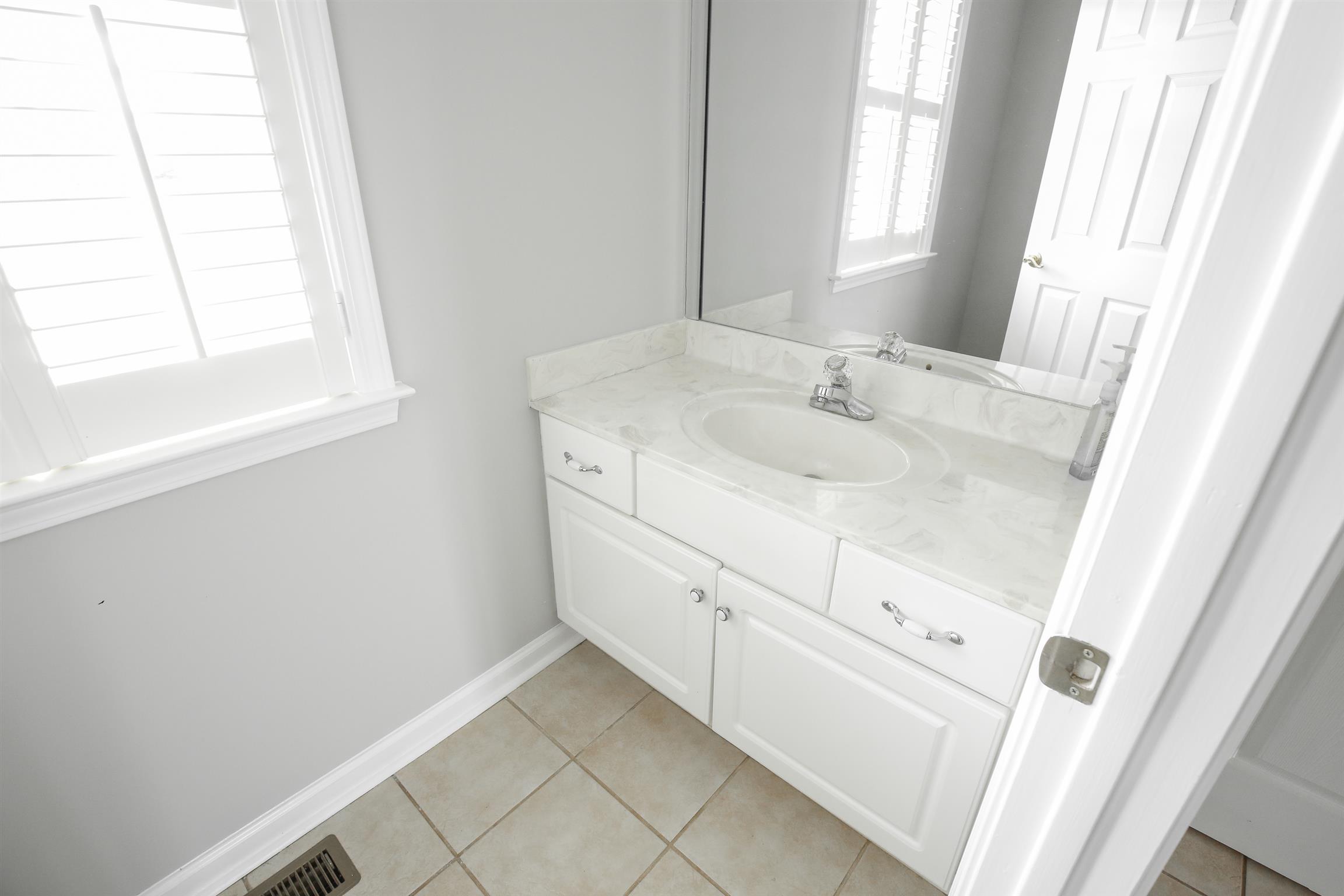 3411 East Compton Road Murfreesboro, TN 37130 - Photo 27 of 30 half bathroom in the mud room