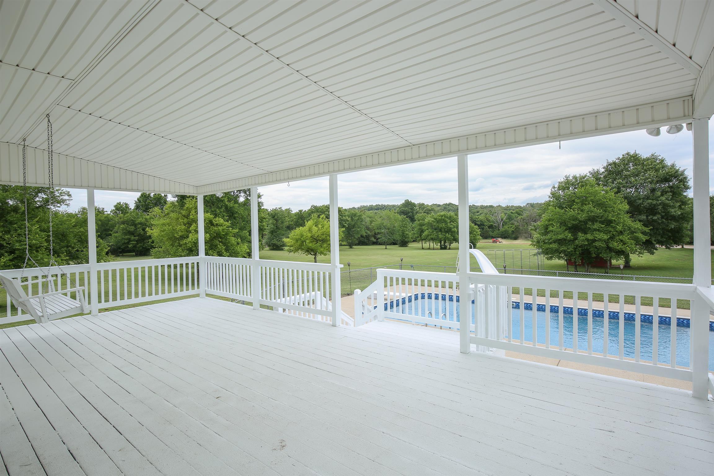 3411 East Compton Road Murfreesboro, TN 37130 - Photo 7 of 30 Back covered deck overlooking the in-ground pool