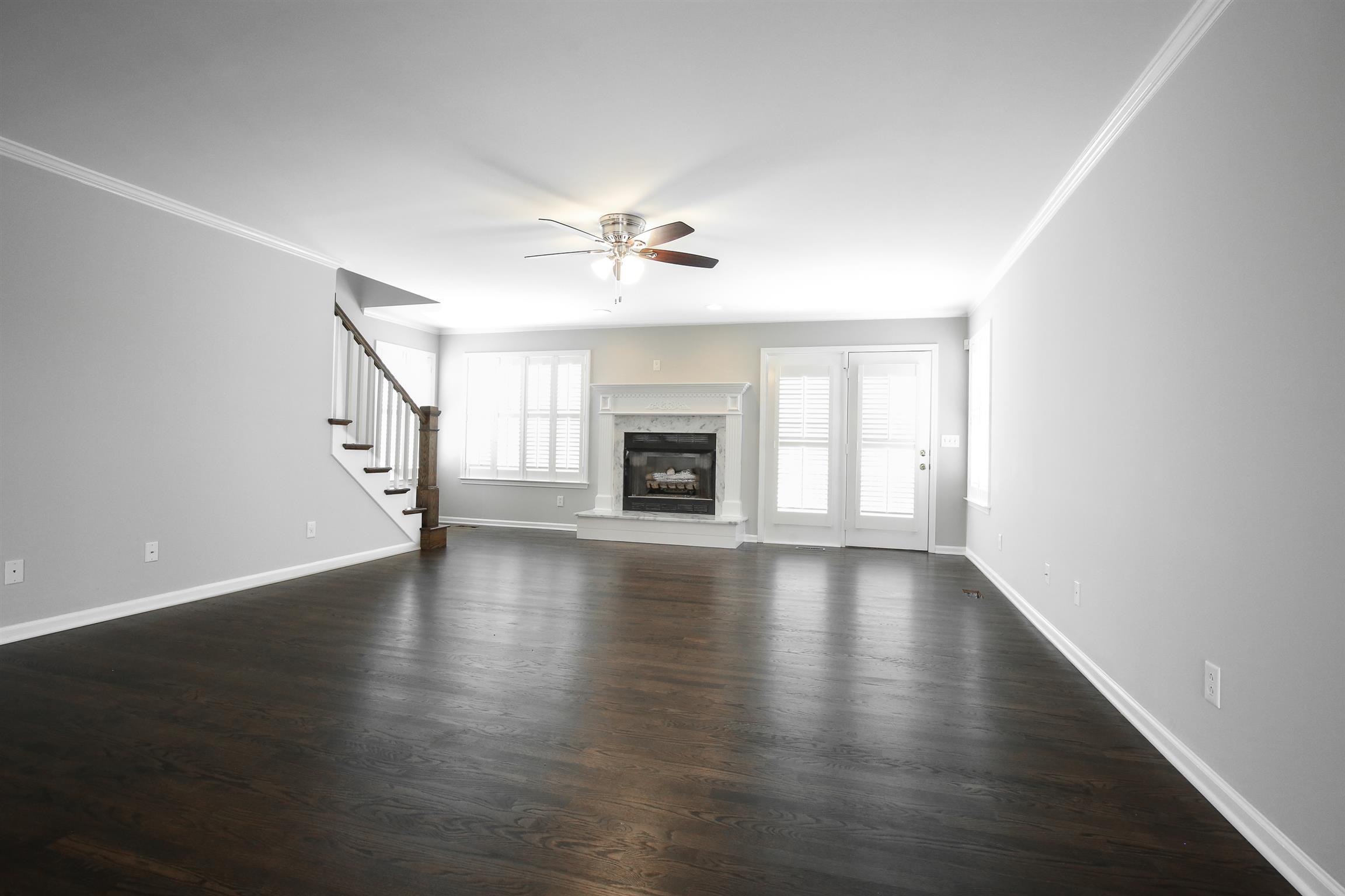 3411 East Compton Road Murfreesboro, TN 37130 - Photo 9 of 30 Living space with ceiling fan, updated hearth and access to the covered back porch