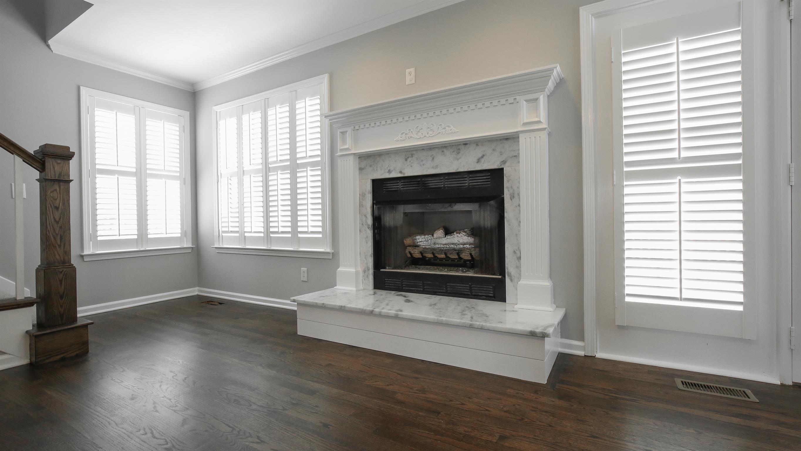 3411 East Compton Road Murfreesboro, TN 37130 - Photo 10 of 30 Updated quartzite and nickel gap hearth. Propane Fireplace. Updated Newel post at the stairway